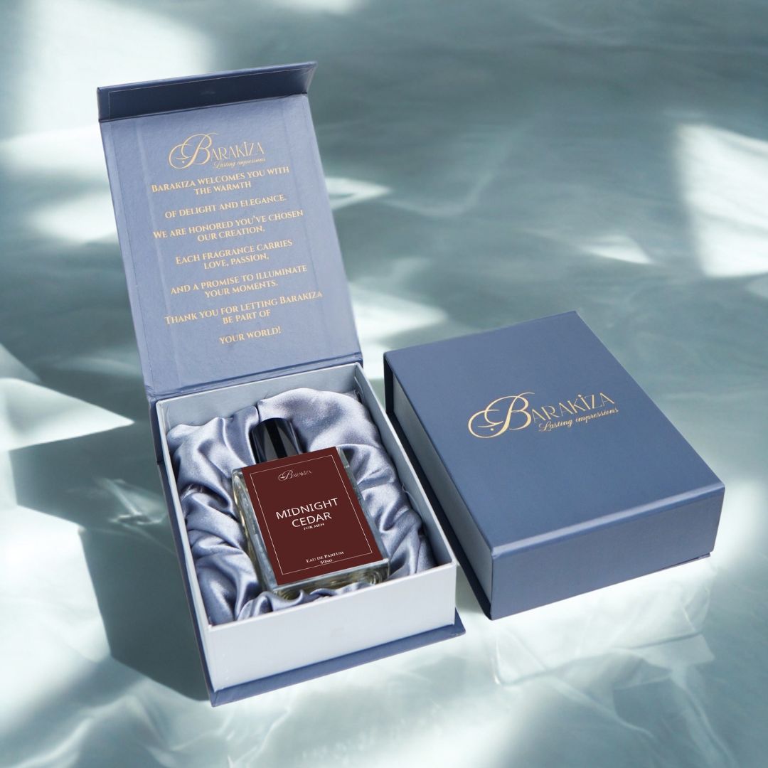 Barakza Midnight Cedar perfume bottle in an open box on a light background