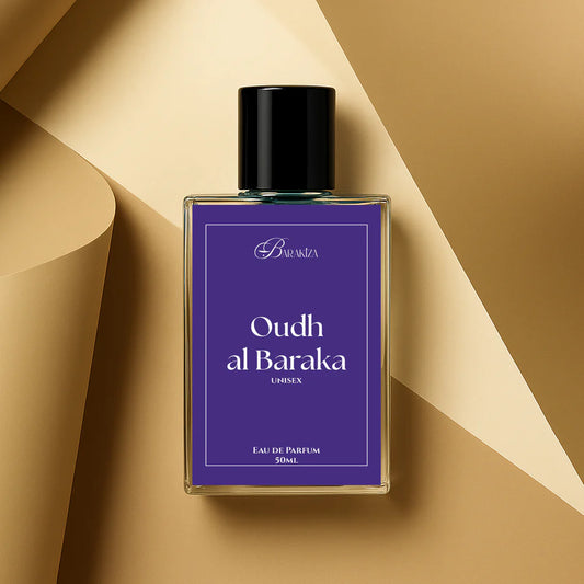 Perfume bottle labeled 'Oudh al Baraka' on a light gray background